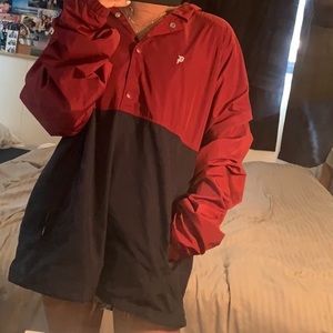 red and navy blue oversized wind breaker pullover